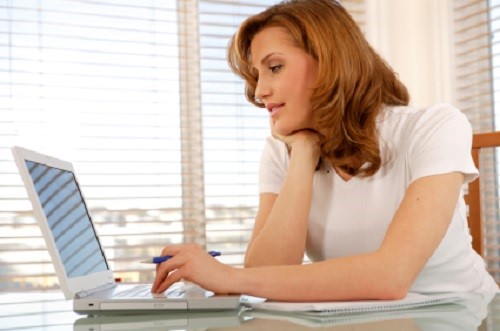Happy couple signing documents